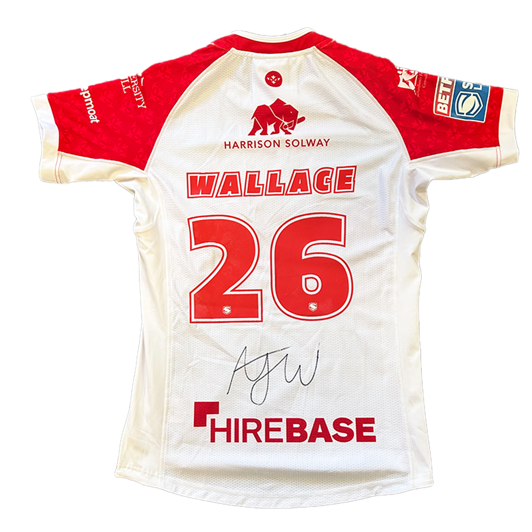 AJAHNI WALLACE SIGNED 2024 HOME SHIRT - AUCTION